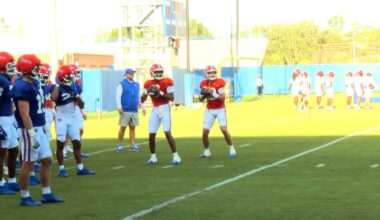 Florida quarterbacks Tramell Jones Jr. (center left) and Aaron Philo (center right) take reps during practice. (Spectrum Sports 360)