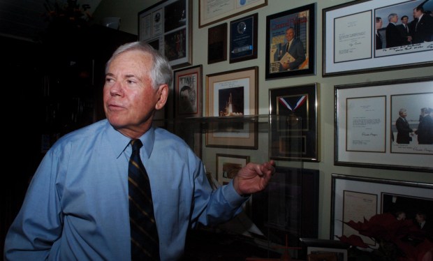Former Orlando Mayor Bill Frederick shows off the mementoes in his home from his reign as mayor and his other careers on Monday, March 14, 2005. (Orlando Sentinel File)