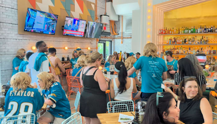 Wigs and Drinks: Jaguars fans kick off football season with first-ever ‘Quarterback Crawl’ in San Marco