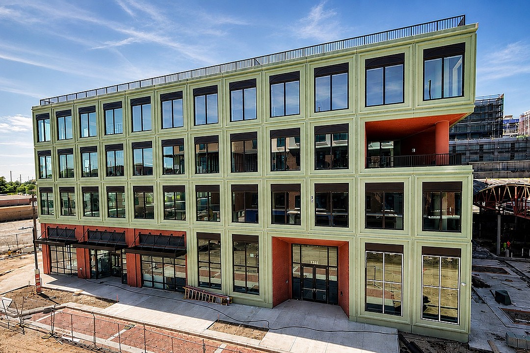 $31B construction product firm leases large space in noted Tampa project