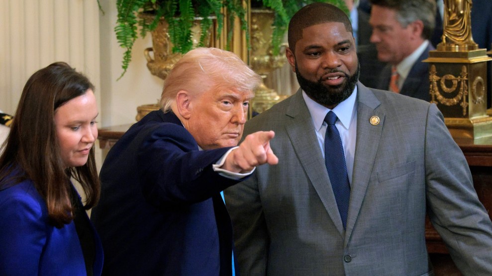 Left to right: Ashley Moody, a white woman in a blue suit, Donald Trump, and Byron Donalds, a Black man in a gray suit.