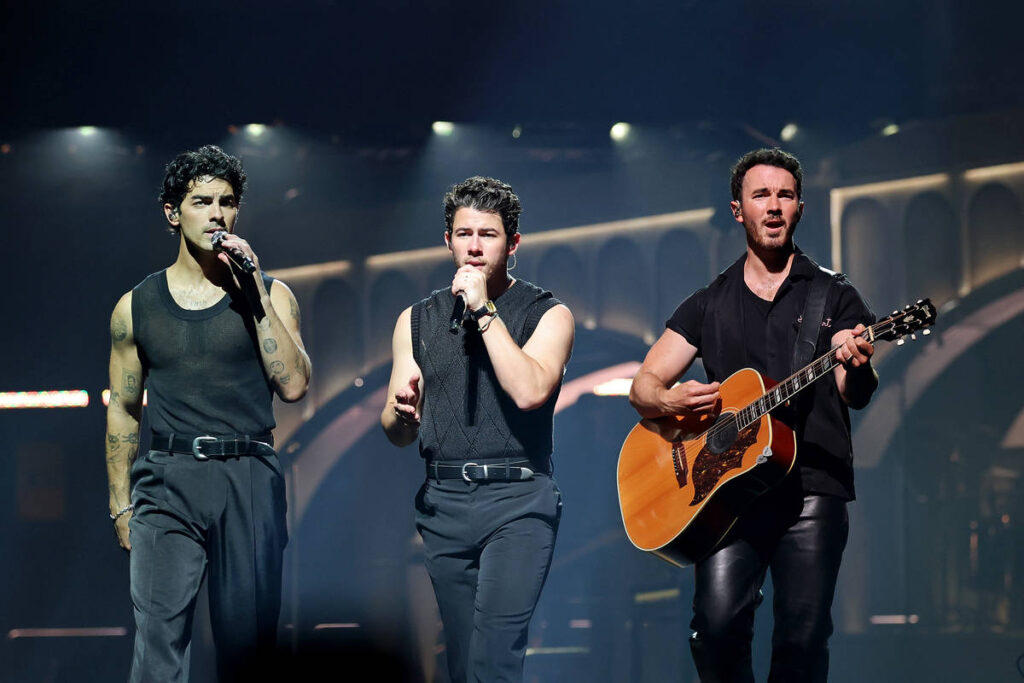 INGLEWOOD, CALIFORNIA - SEPTEMBER 06: (L-R) Joe Jonas, Nick Jonas, and Kevin Jonas perform on stage during Jonas Brothers: JONAS20 Greetings From Your Hometown Tour at Intuit Dome on September 6, 2025 in Inglewood, California.