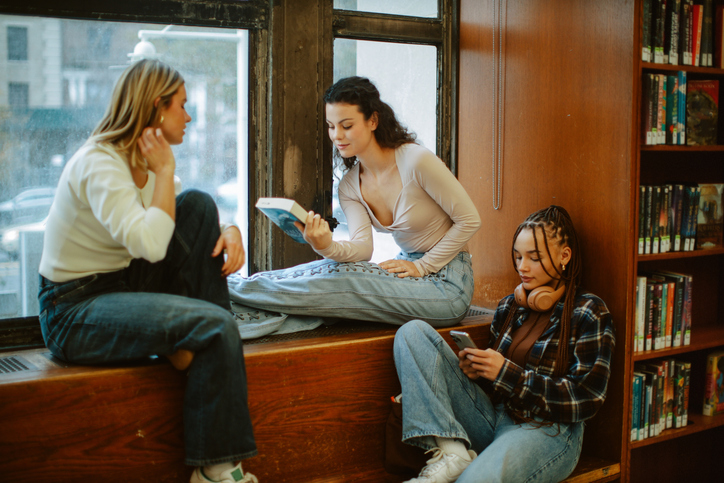 Much of higher level education involves reading various stories, books and information. One professor was allegedly fired when one of her long-term assigned readings was questioned by a student who felt "uncomfortable" reading it. The professor is now suing her former employer for her firing. (lechatnoir / Getty Images)