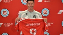 CHICAGO, ILLINOIS - JULY 14: Robert Lewandowski (9) poses with a jersey after being introduced by the Chicago Fire FC at a press conference at Endeavor Health Performance Center in Chicago, Illinois on July 14, 2026. (Photo by Jacek Boczarski/Anadolu via Getty Images)