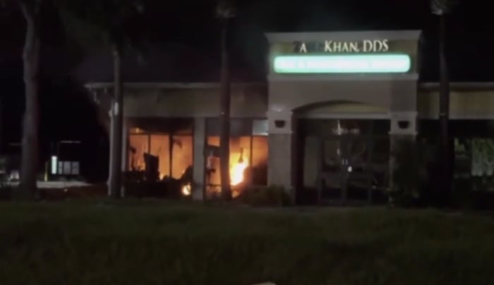 Neighbors report feeling explosion as fire damages oral surgery center
