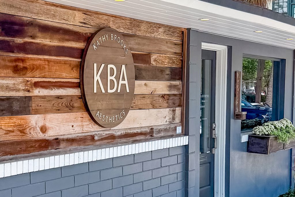 outside location photo with KBA sign