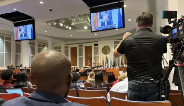 Audience members watch during a Jacksonville budget session