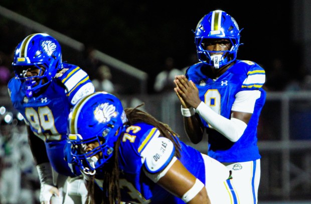 Freshman quarterback Deuce Woods threw 3 touchdown passes as The First Academy cruised to a 58-7 victory over Dr. Phillips. (Hailey Steinberg/For the Sentinel)