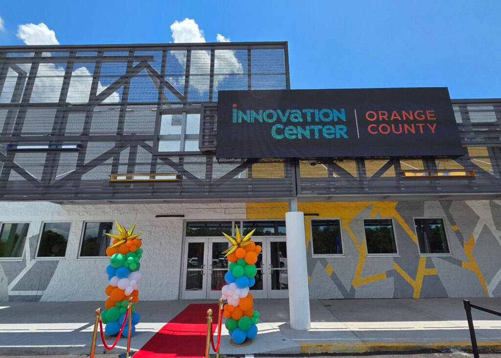 Building exterior with a sign that says Innovation Center Orange County