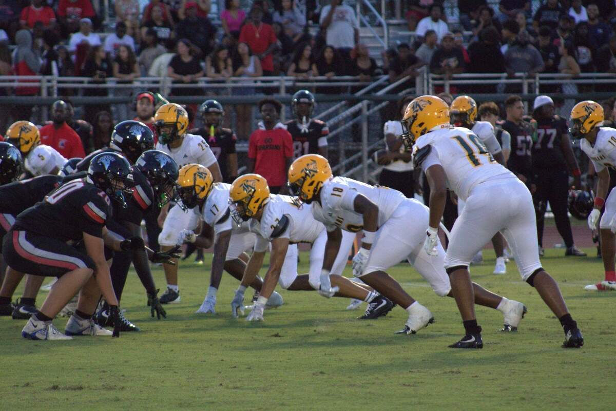 Miami Killian Senior High’s defense lines up against Miami Southridge Senior High on Aug. 14.