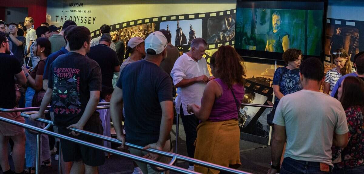 Movie goers lined up early to see the sold out, epic film “The Odyssey” at the movie theater in the Museum of Discovery and Science, which is the only theater in South Florida, showing the film in 70mm IMAX, on Friday August 07, 2026.