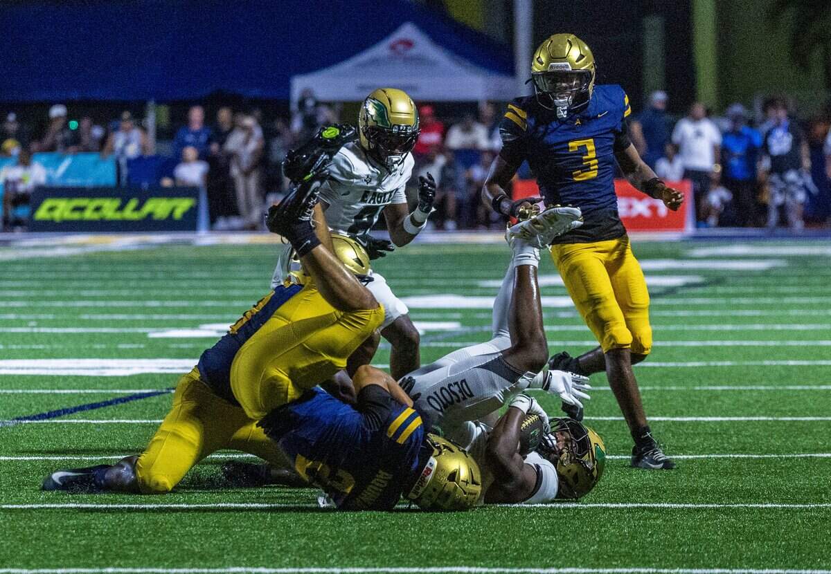 Aquinas' (LB) Levi Champion (2) tackles Desoto's (CB) SaRod Baker (5) during the first half of a game between St. Thomas Aquinas vs. DeSoto High part of the 2026 Broward County National High School Football Showcase, in Fort Lauderdale , Florida, on Saturday August 29, 2026.