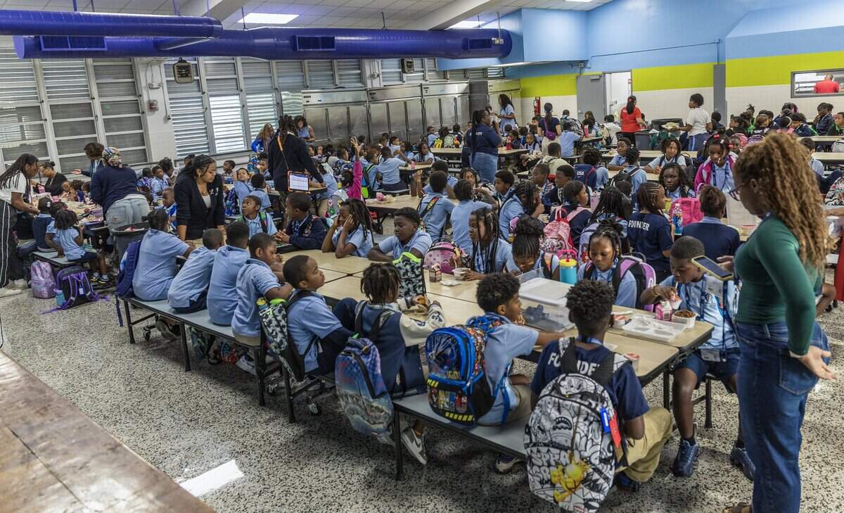 Students enjoy breakfast early morning at KIPP Legacy Elementary at the former site of the Poinciana Park Elementary, located at 6745 NW 23rd Ave, in Liberty City, Miami, Florida, on Friday August 21, 2026.