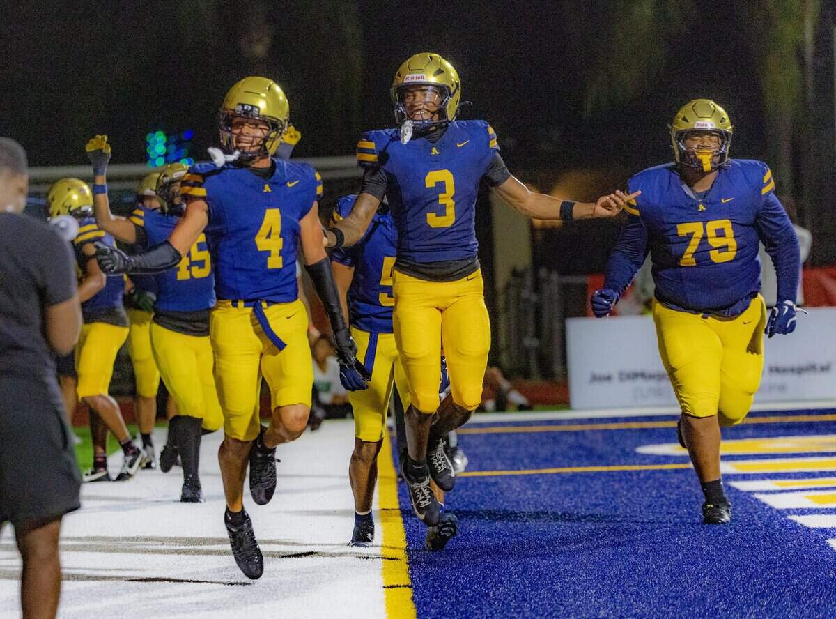 Aquinas' players celebrates a touchdown by (DB) Jaden Carey (4), during the first half of a game between St. Thomas Aquinas vs. DeSoto High part of the 2026 Broward County National High School Football Showcase, in Fort Lauderdale , Florida, on Saturday August 29, 2026.