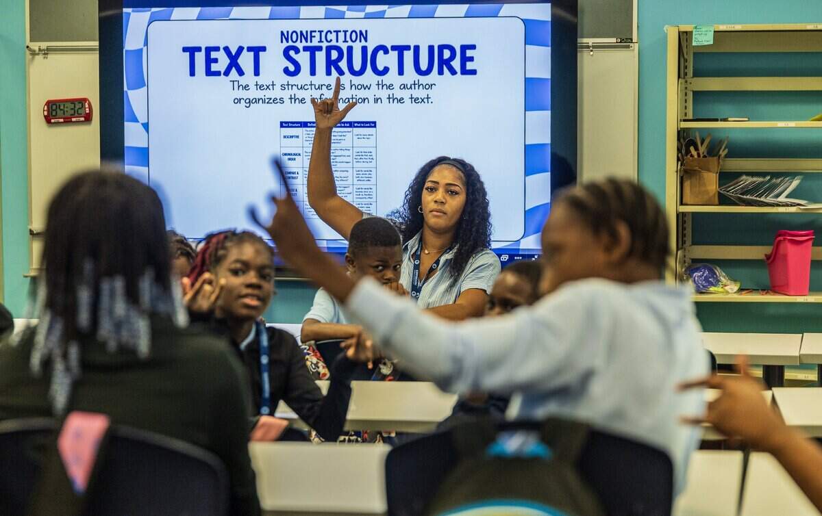 Teacher N'y Asiah teaches writing to third grade students at KIPP Legacy Elementary at the former site of the Poinciana Park Elementary, located at 6745 NW 23rd Ave, in Liberty City, Miami, Florida, on Friday August 21, 2026.