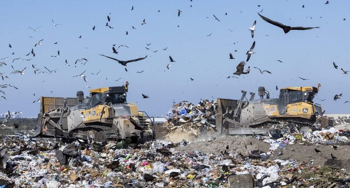 Crews use heavy equipment at the South Dade Landfill on Friday, Feb. 6, 2025, in Homestead, Fla.