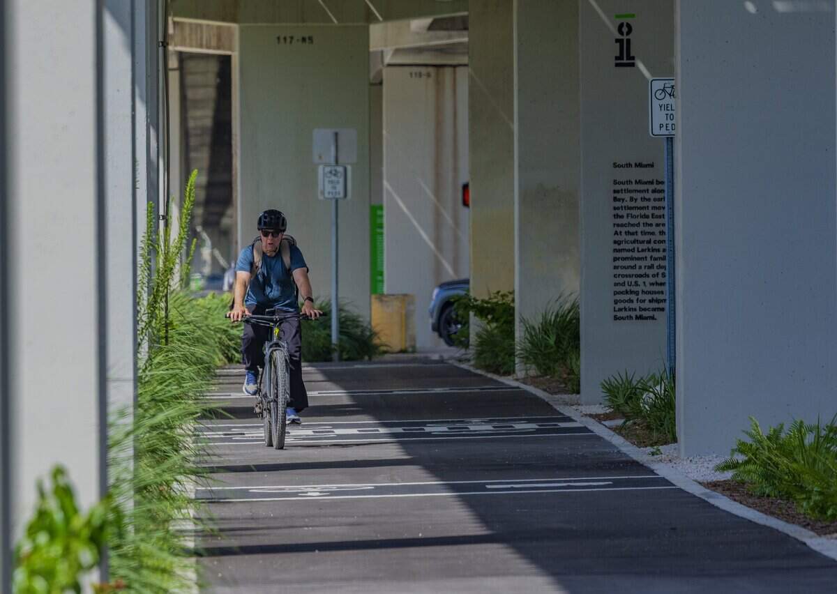 A biker rides on the underline pathway during the Nikki Spoelstra Play Forest Grand Opening ceremony, in South Miami's section of The Underline, sponsored by Mrs. Spoelstra, on Saturday August 15, 2026.