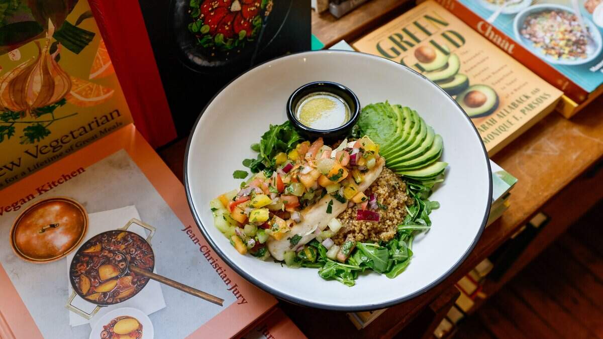 Tropical Mahi Mahi is now offered at The Café at Books & Books. General manager Jonah Kaplan has created a new menu at The Café in Coral Gables, Florida, on Tuesday, August 4, 2026.