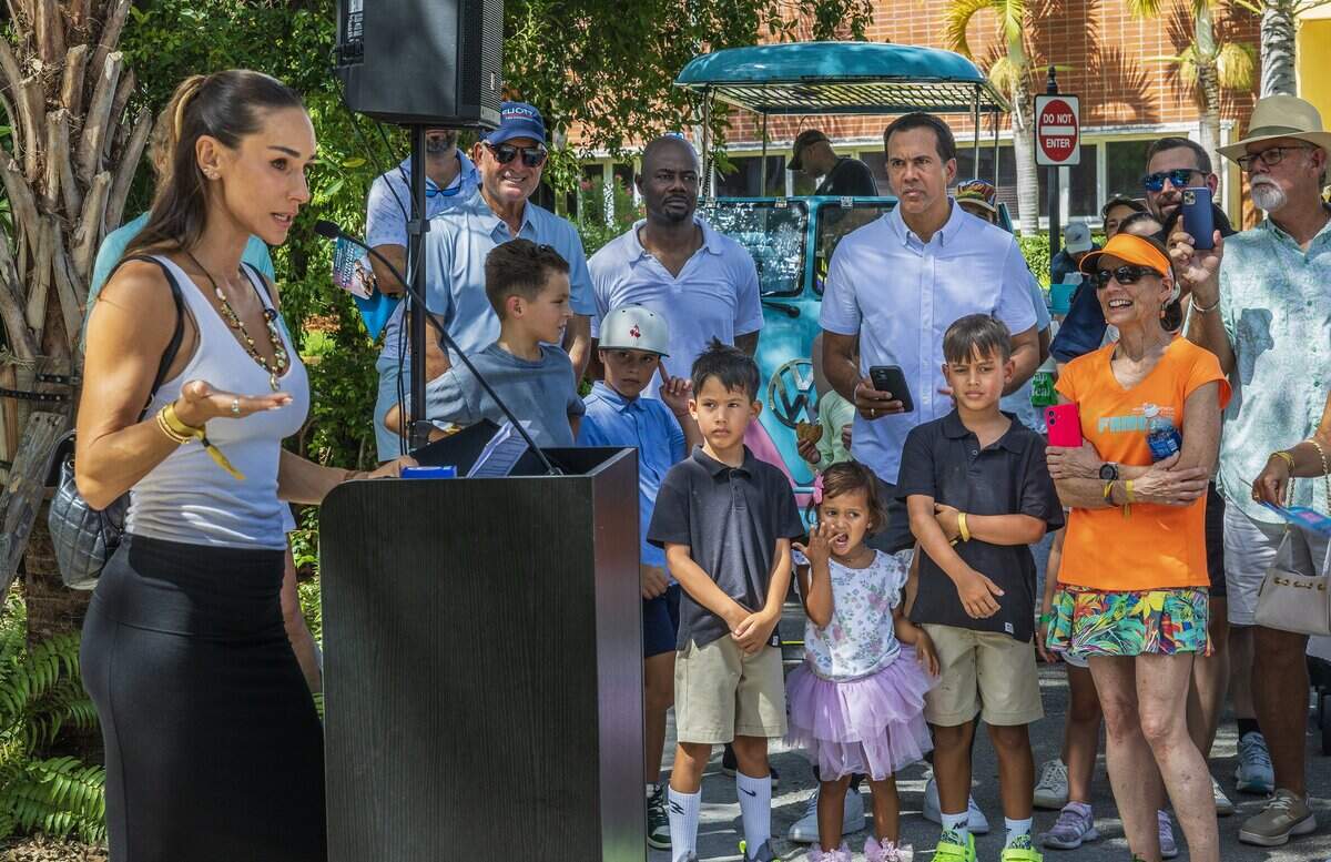 Miami Heat head coach Erik Spoelstra with his children joined his ex-wife Nikki Spoelstra as she speaks, during the Nikki Spoelstra Play Forest Grand Opening ribbon ceremony, in South Miami's section of The Underline, sponsored by Mrs. Spoelstra, on Saturday August 15, 2026.