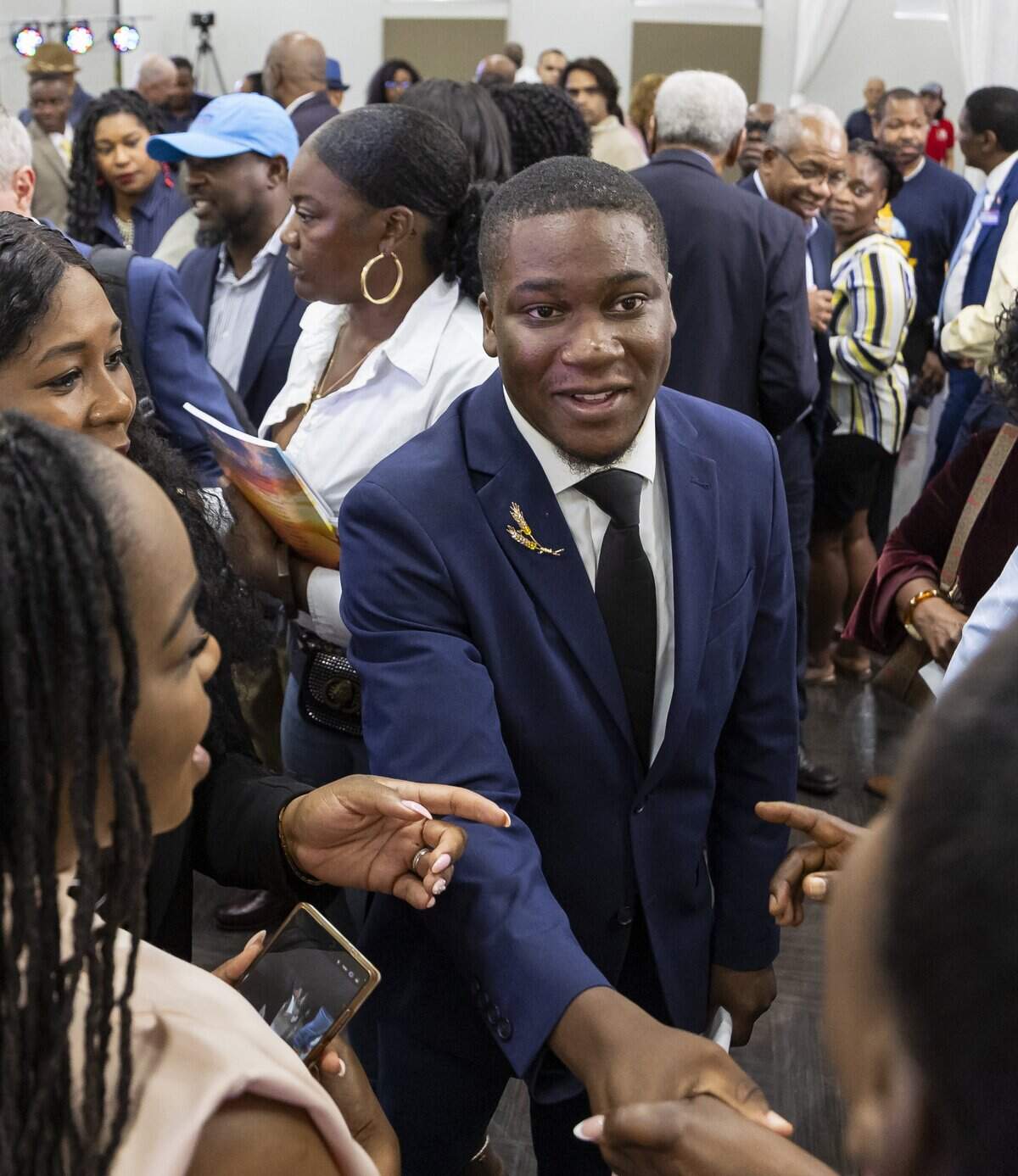 Elijah Manley shakes hands with guests after participating in a debate ahead of the Democratic primary for U.S. House Florida District 20 at the Urban League of Broward County on Wednesday, June 17, 2026, in Fort Lauderdale, Fla.