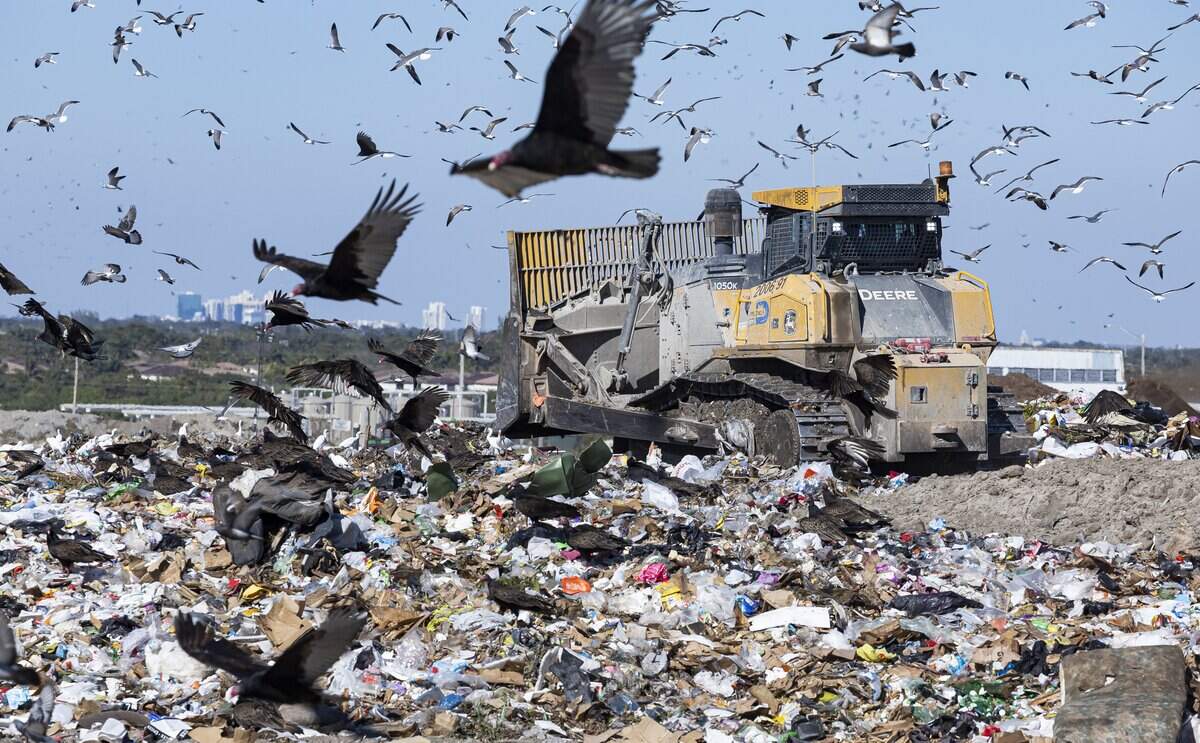 Crews use heavy equipment at the South Dade Landfill on Friday, Feb. 6, 2025, in Homestead, Fla.