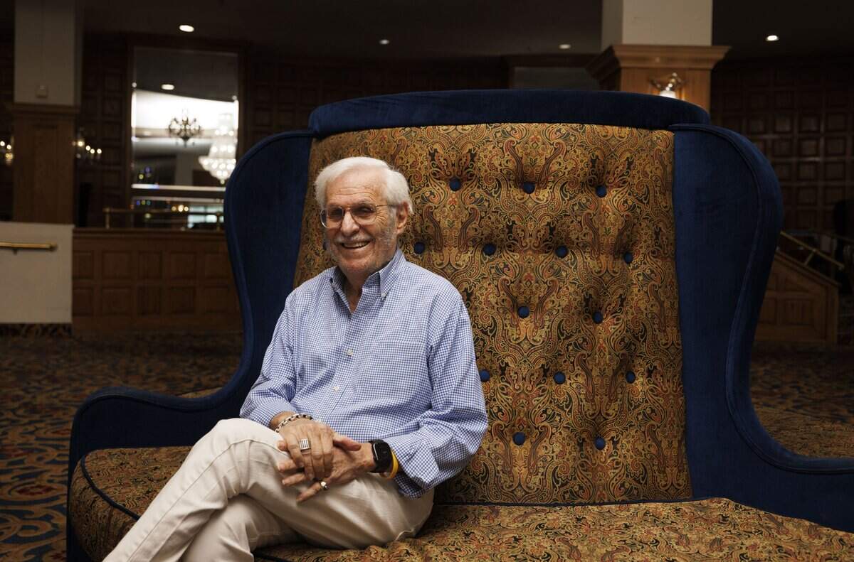 Stu Blumberg, the original general manager, poses in the lobby outside the old Playboy Theater on Thursday, Dec. 4, 2025, at the Castle Hotel in Miami Beach, Fla. IT had been 55 years since he has been back. “We opened it as the newest hotel in Miami Beach 58 years ago now,” said Blumberg.