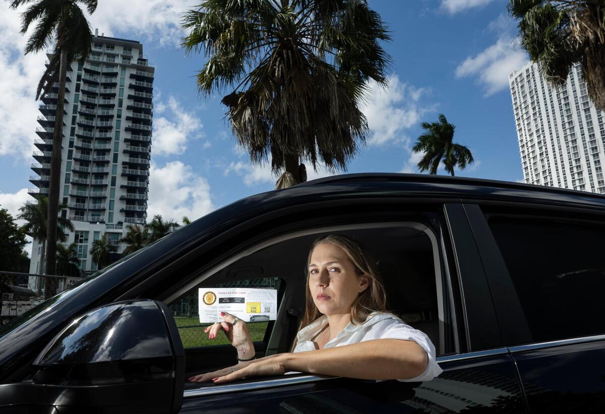 Jennifer Gonzalez, who was fined by BusPatrol despite driving legally, says Miami-Dade’s bus safety program appears to deliberately make it difficult to challenge the fines so people will just pay.
