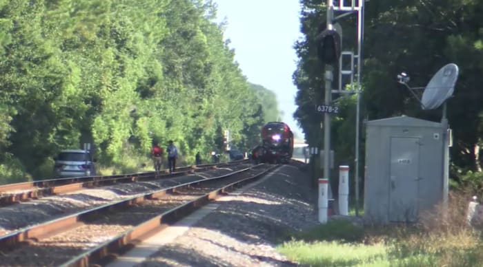 Woman killed when Amtrak train hits SUV on Moncrief Road