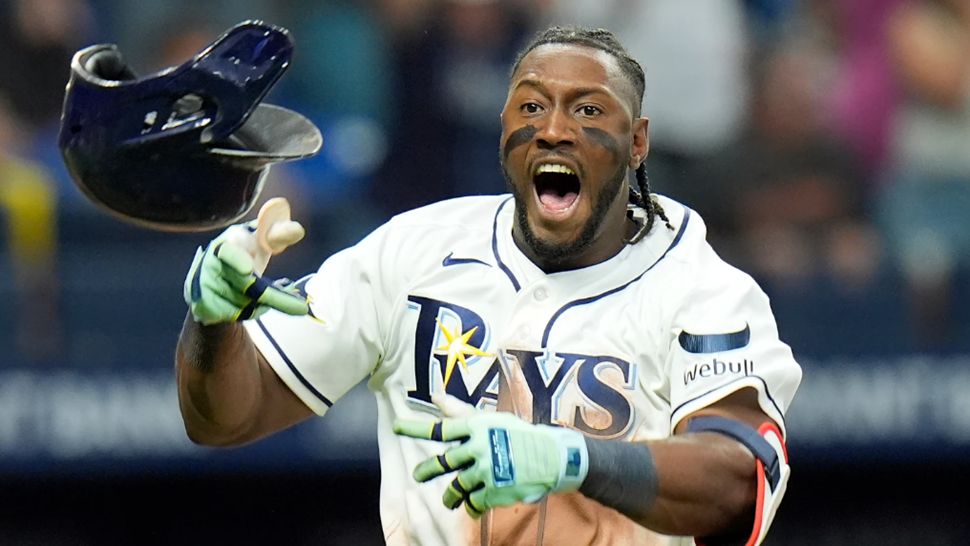 Tampa Bay Rays' Jorge Mateo celebrates his walk off hit against San Diego Padres pitcher David Morgan during the 11th inning of a baseball game Sunday, Aug. 30, 2026, in St. Petersburg, Fla. (AP Photo/Chris O'Meara)