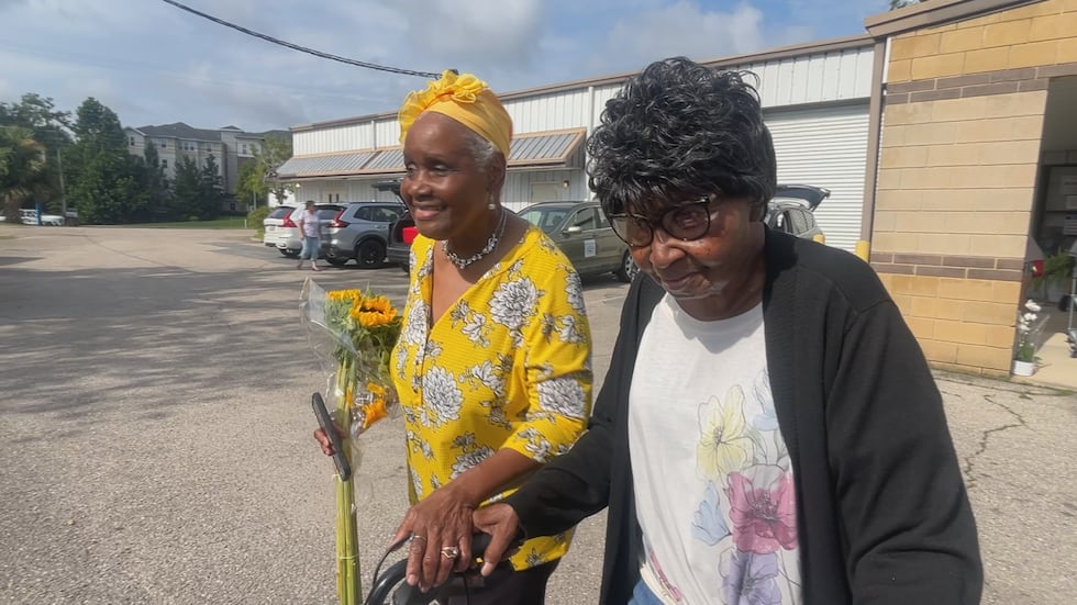 Friends Joyce Donaldson Roberts and Mable Dean picked up fans Friday to try to beat the heat.