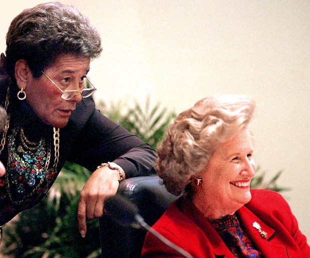 Commissioner Mable Butler (left) shares a comment with Chairman Linda Chapin at their final meeting of the Orange Board of County Commissioners Nov. 10, 1998. The women's eight years on the board blazed a trail. (Orlando Sentinel File)