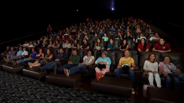 People inside of a movie theater