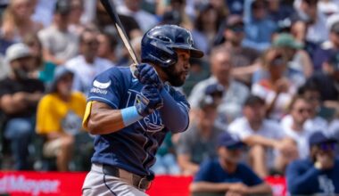 Tampa Bay Rays' Cedric Mullins hits an RBI single during the fifth inning of a baseball game against the Seattle Mariners, Sunday, Aug. 9, 2026, in Seattle. (AP Photo/Stephen Brashear)