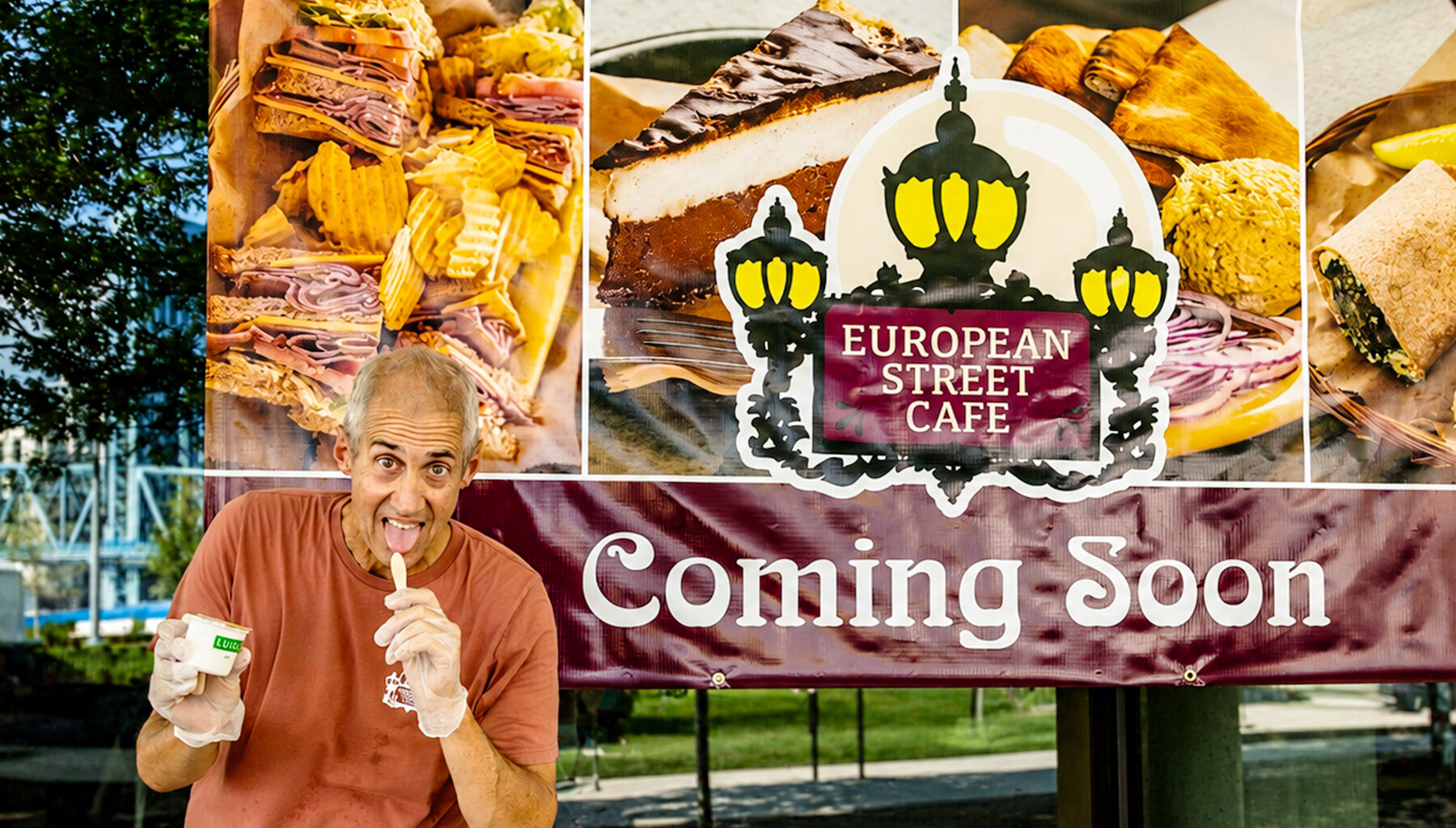 Andy Zarka poses for the camera at European Street Cafe’s “coming soon” pop-up event during the City’s 4th of July celebrations.