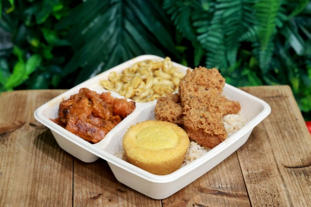 Southern comfort foods, including mac and cheese, candied yams, and crispy chick'n, are served at C4Eats in Hollywood on Thursday, Aug. 5, 2026. C4Eats serves vegan breakfasts and lunches, including diner favorites styled after traditional sausage, bacon, eggs, fish fillets, and pancakes. (Mike Stocker/South Florida Sun Sentinel)