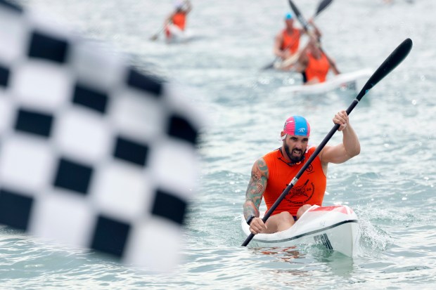 Ramon Calvo, of Dania Beach Ocean Rescue paddles his surfski to a semifinal qualifying finish during the United States Lifesaving Association National Lifeguard Championships on Fort Lauderdale Beach on Wednesday, Aug. 5, 2026. (Amy Beth Bennett / South Florida Sun Sentinel)