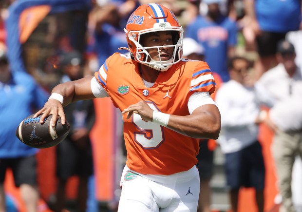 Florida quarterback Tramell Jones Jr. looks to pass during the Gators 2026 Orange & Blue Game April 11 at Ben Hill Griffin Stadium in Gainesville. (Stephen M. Dowell/Orlando Sentinel)