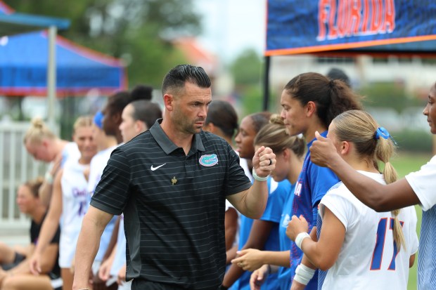 New Florida soccer coach Nick Zimmerman walks the sideline prior to the Gators' 3-1 upset of No. 3 Florida State Aug. 23, 2026 at Dizney Stadium in Gainesville. (Courtesy UF's University Athletic Association Communications)