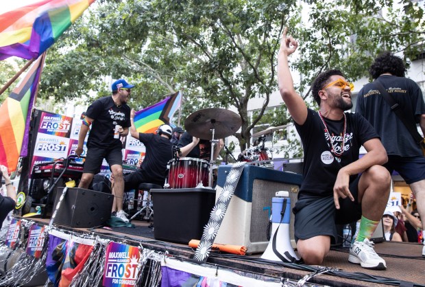 ​​U.S. Representative Maxwell Frost rocks out on his float during the Pride Parade in downtown Orlando in 2023. Frost, the first Gen Z member of Congress, was elected as a Democrat to his Orange County district at the age of 25 in 2022. (Orlando Sentinel file)