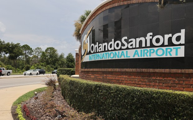 Traffic is lined up at the entrance to Orlando Sanford International Airport on Friday, July 31, 2026. (Stephen M. Dowell/Orlando Sentinel)