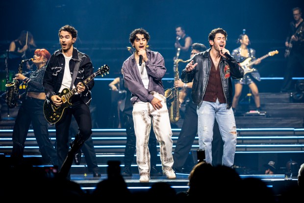 The Jonas Brothers, from left, Kevin, Joe and Nick perform at Amway Center in Orlando on Oct. 13, 2023. The group will appear again in Orlando on Oct. 16 performing two sets with an intermission and music from five albums. (Patrick Connolly/Orlando Sentinel)