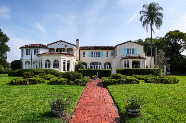 A view from the backyard of Merrywood, the 7,300-square-foot, 3.7-acre estate designed by renowned architect James Gamble Rogers II, located on Palmer Avenue in Winter Park, Tuesday, June 30, 2026. The fate of the empty villa built in 1939 is being debated by city leaders and preservationists who want to prevent its possible demolition. (Joe Burbank/Orlando Sentinel)