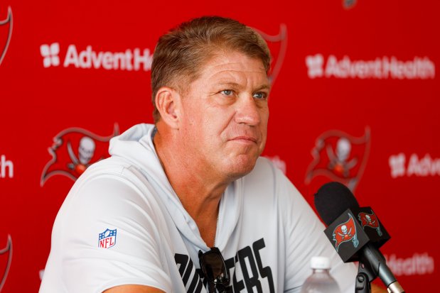 Jason Licht answers questions from reporters Thursday, Aug. 6, 2026, in Tampa. "I have no plans on trading Vita," the Bucs general manager said of two-time Pro Bowl defensive tackle Vita Vea. (Jefferee Woo/Tampa Bay Times)