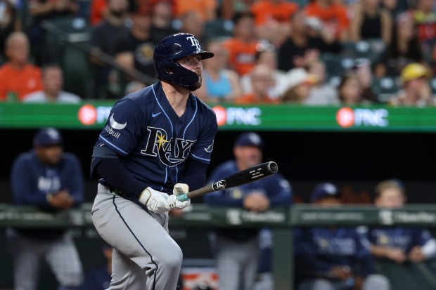 Tampa Bay Rays' Liam Hicks watches his home run off Baltimore Orioles pitcher Brandon Young during the second inning of baseball game in Baltimore, Saturday, Aug. 22, 2026. (AP Photo/Terrance Williams)