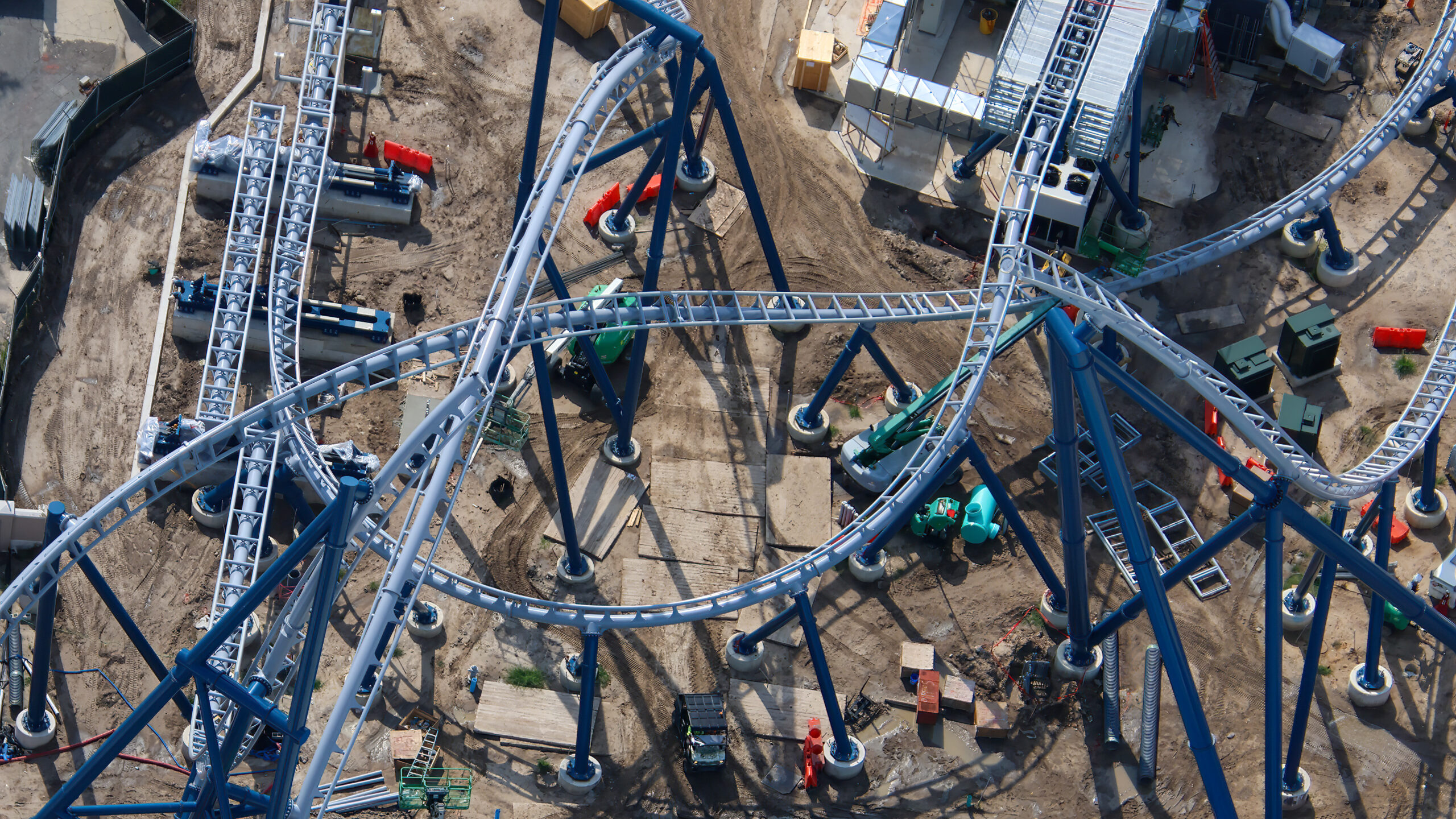 Aerial photographer bioreconstruct shared new views of the sprawling construction site, offering some of the clearest looks yet at the attraction’s interconnected track, station, launch, and maintenance areas.