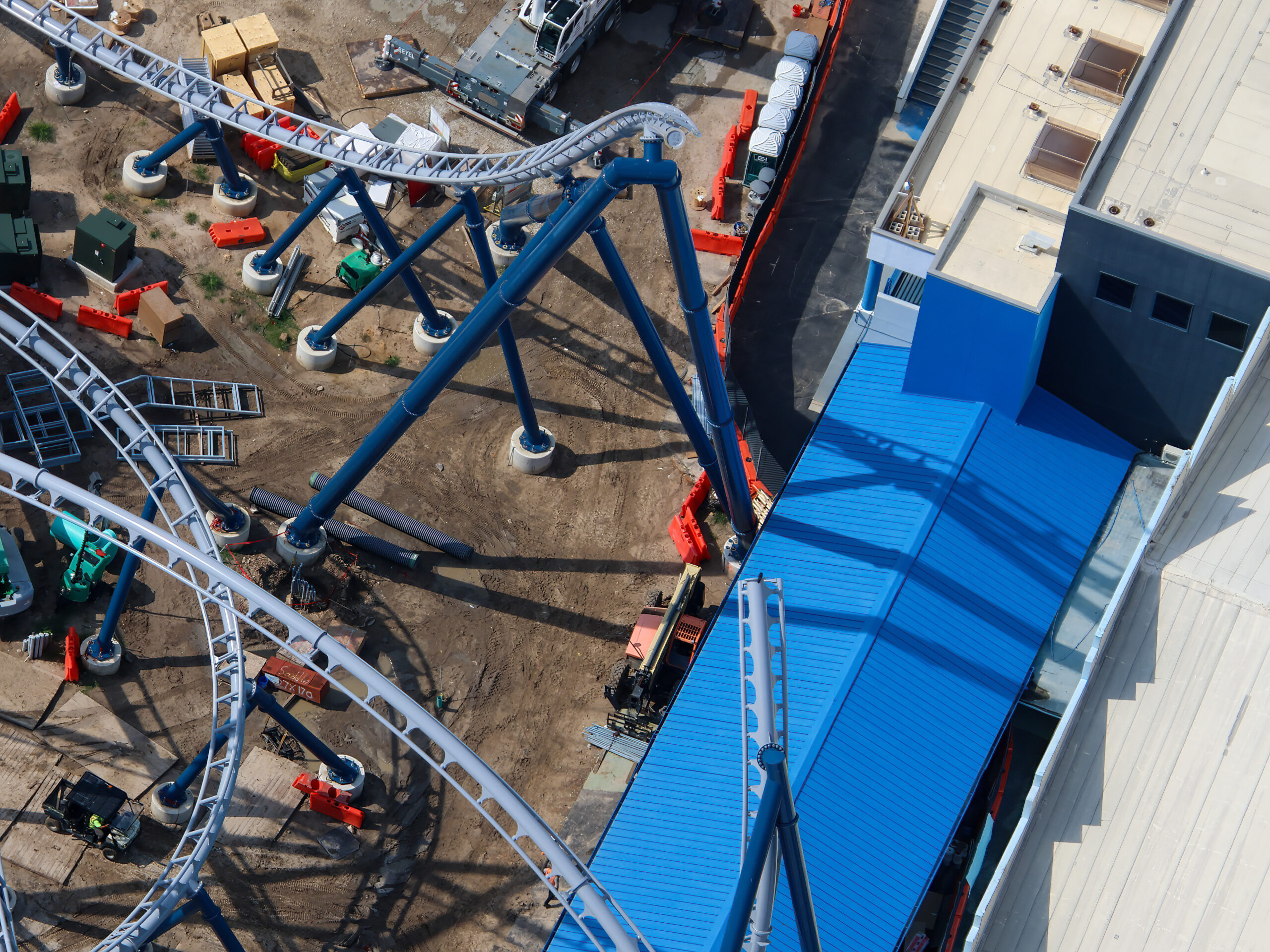 Aerial photographer bioreconstruct shared new views of the sprawling construction site, offering some of the clearest looks yet at the attraction’s interconnected track, station, launch, and maintenance areas.