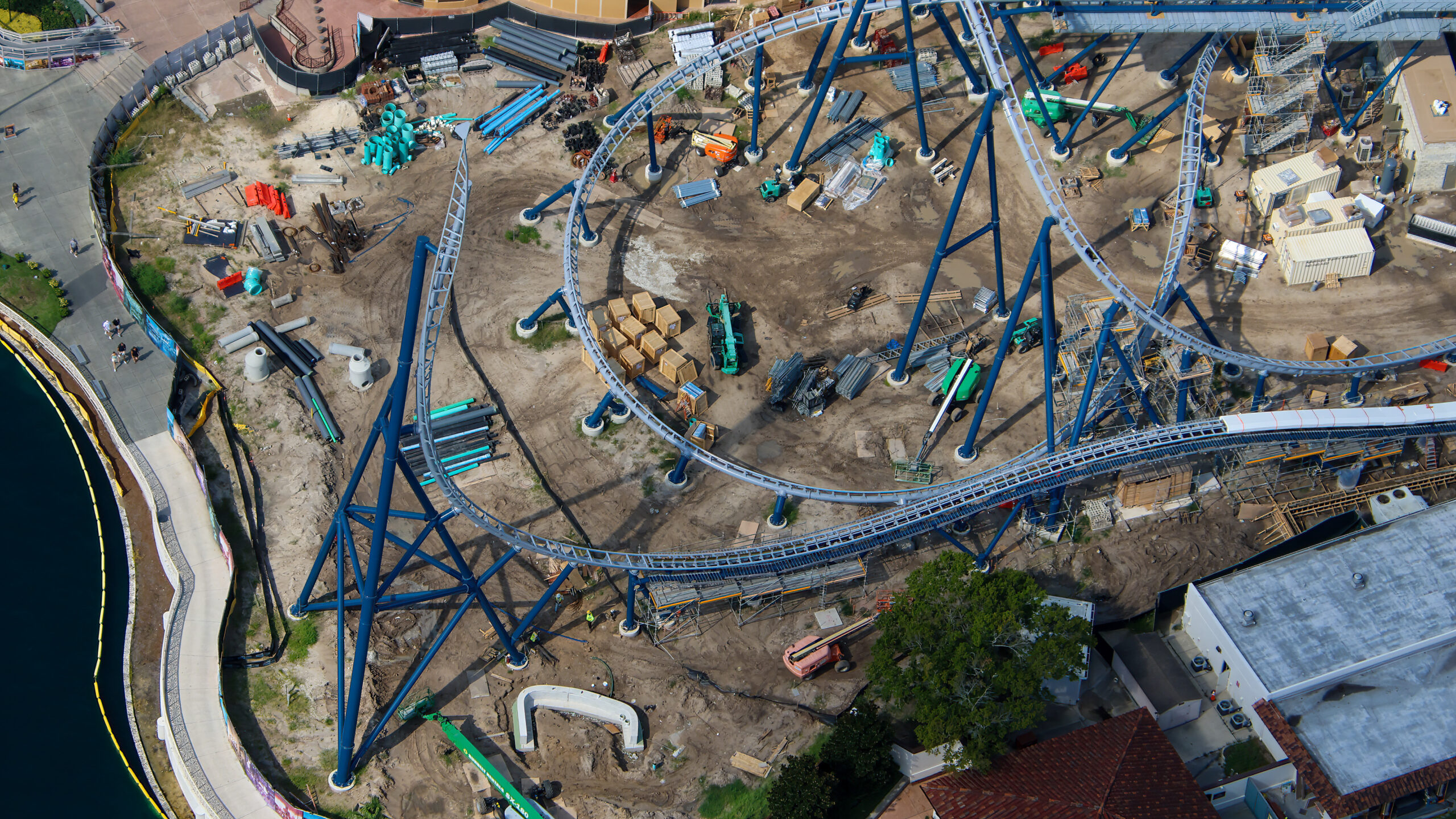Aerial photographer bioreconstruct shared new views of the sprawling construction site, offering some of the clearest looks yet at the attraction’s interconnected track, station, launch, and maintenance areas.