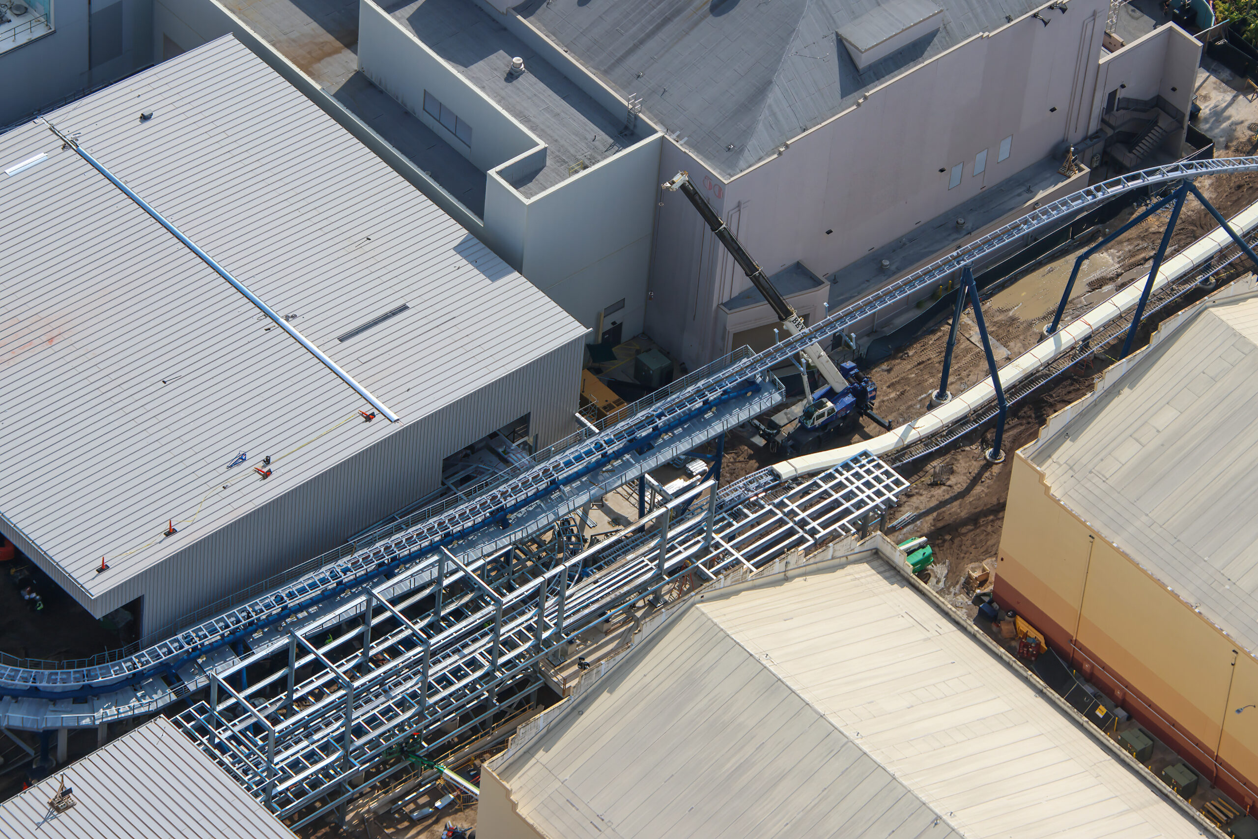 Aerial photographer bioreconstruct shared new views of the sprawling construction site, offering some of the clearest looks yet at the attraction’s interconnected track, station, launch, and maintenance areas.