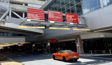 Red Express Curbsides at Tampa International Airport with signs directing travelers to Red Side airlines.