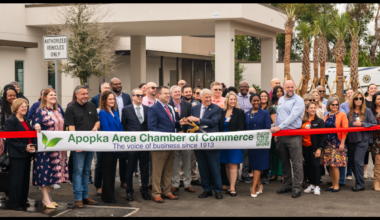 Members of the Apopka Area Chamber of Commerce and community representatives gather for a ribbon-cutting ceremony earlier this year. The chamber will host a Business After Hours networking event Thursday, Aug. 27, at Hurricane Grill & Wings Apopka, with a portion of checks benefiting Lighthouse Leaders at Wekiva High School.
